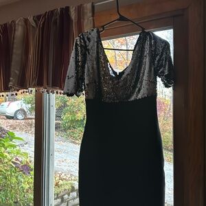 Brand New with tags. Stretch bottom fabric with beaded top. Perfect !